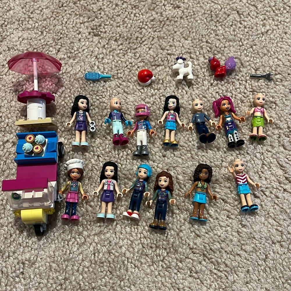13 Lego Figures plus accessories shown